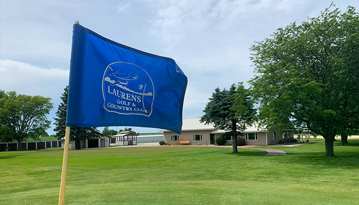 Blue flag that says "Laurens Golf & Country Club"