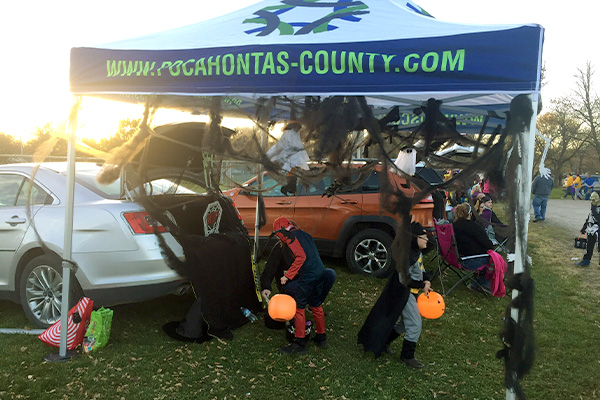 Kids in Halloween costumes at the Trunk or Treat event