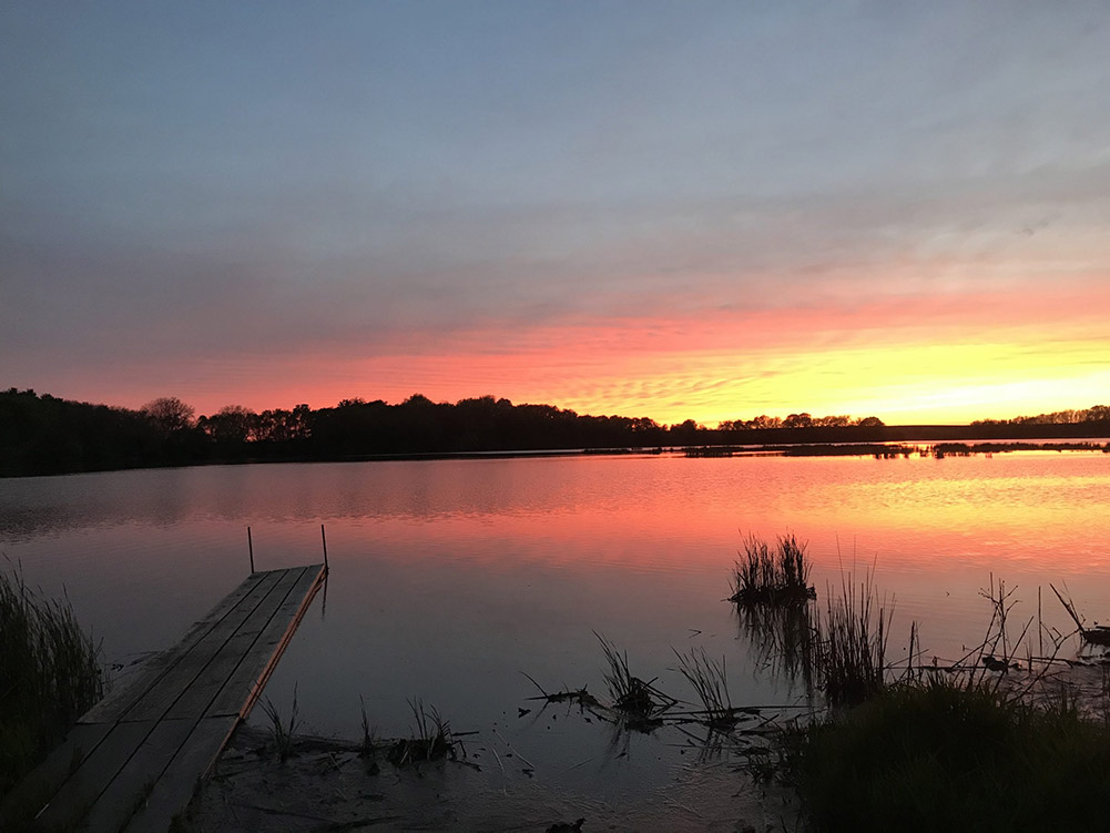 Sunset over water at Sunken Grove